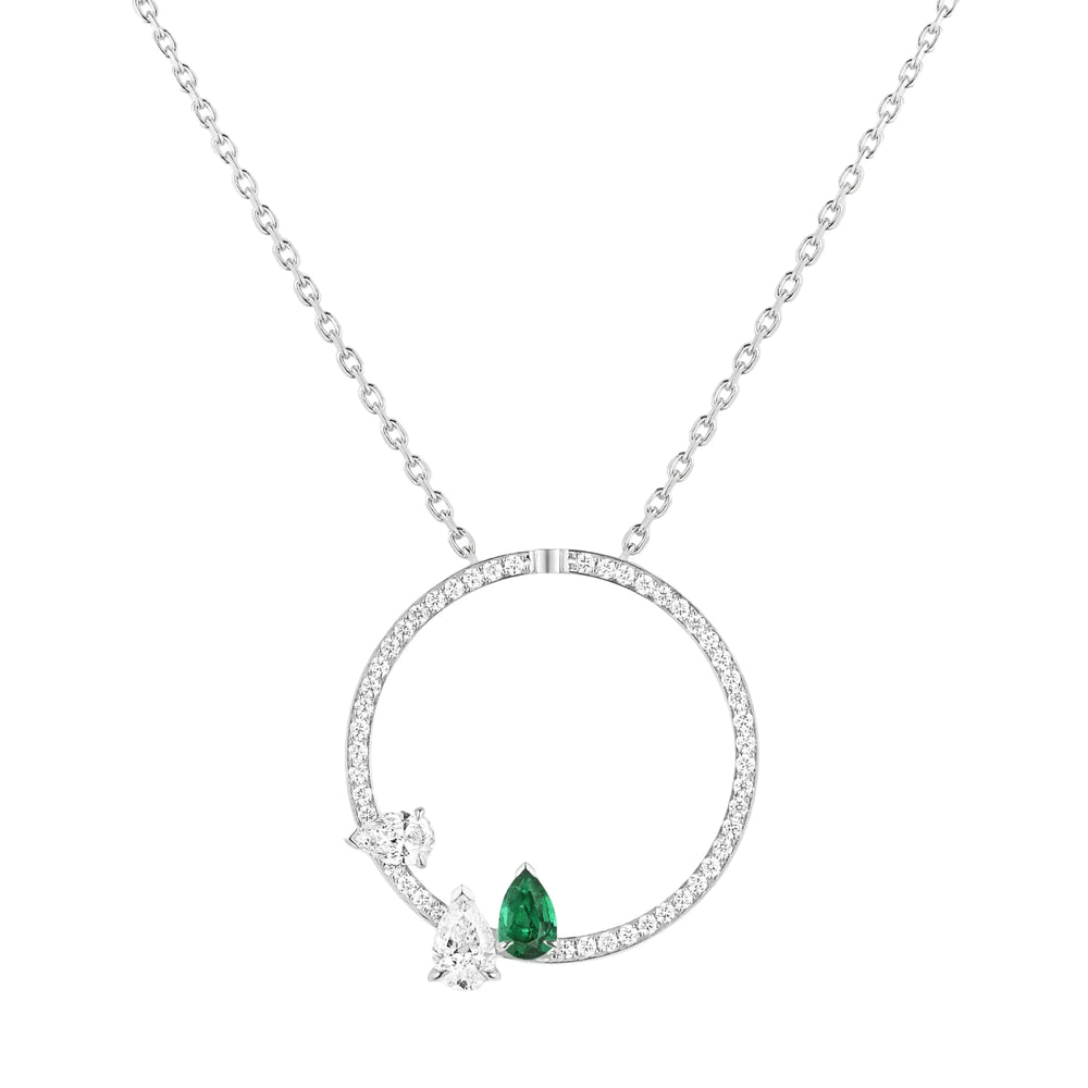 Pendentif serti sur vide en or blanc avec 2 diamants taille poire et 1 émeraude taille poire - PSV3AAWGE0000